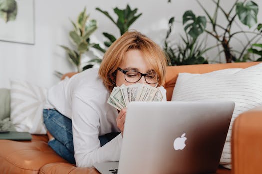 freelancer reviewing budget on a laptop