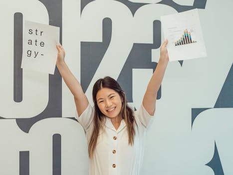 image of a happy artist with a savings goal chart