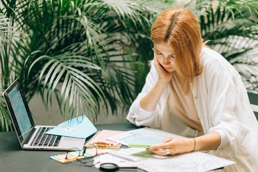 Freelancer reviewing financial documents