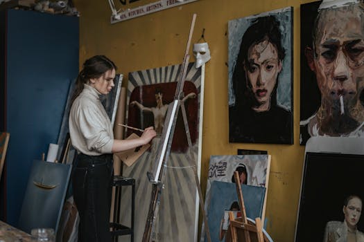 artist painting in a studio