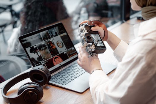 image of a photographer working on a laptop